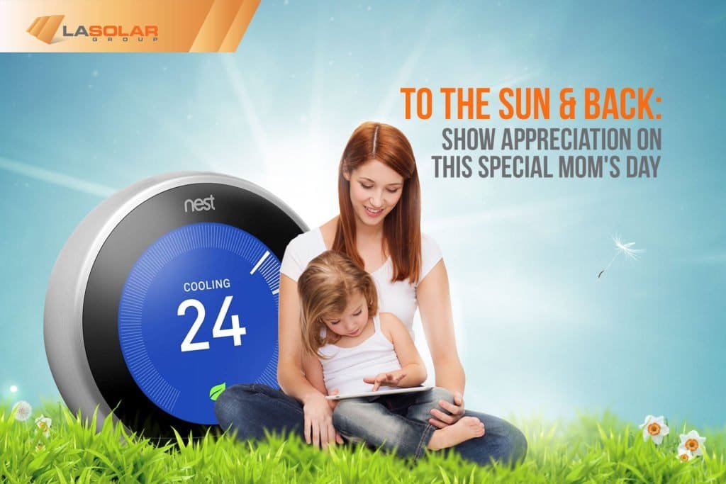 Mother-And-Daughter-Sitting-On-The-Grass
